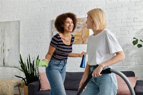 A Lesbian Couple Laughs Together While Stock Photo Image Of Lesbian Multicultural 335320586