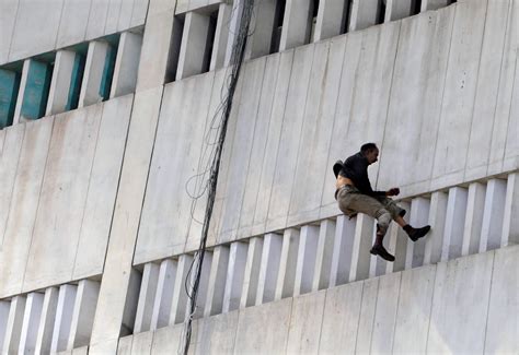 5 people plunge to their deaths trying to escape burning building in