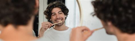 Cheerful Gay Couple Brushing Teeth In Stock Photo Image Of Bearded