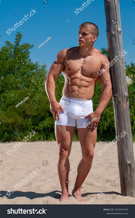 Athletic Shirtless Male Model Flexing Muscles Shutterstock