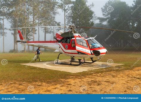 Airbus Eurocopter AS350 Helicopter with a Flight Crew Pre Flight External Check Editorial Image ...