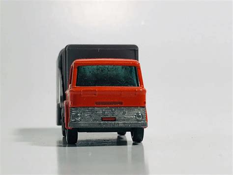 Photo of Orange Dump Truck Toy · Free Stock Photo