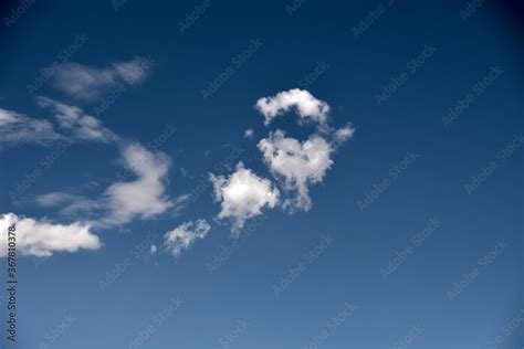 Cumulus Clouds Look Like Fluffy White Cotton Balls In The Sky