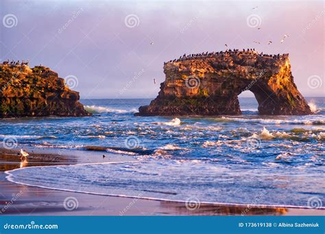 Dramatic Pink Sunset Over Natural Bridges State Beach in Santa Cruz ...