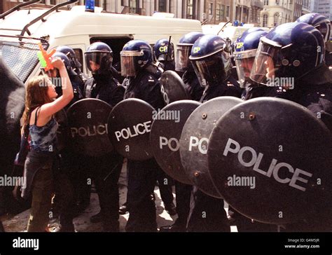 Police In Riot Gear Confront An Angry Demonstrator At London Wall In