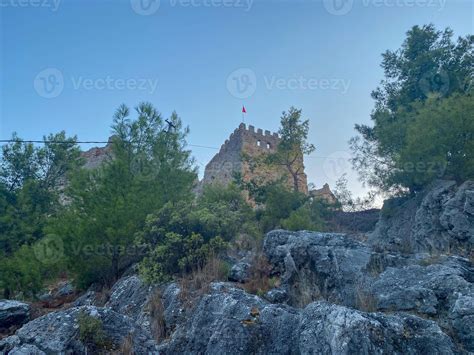 Ancient old medieval fortress, castle, hidden ruins made of stones in a