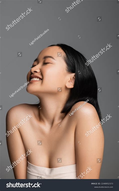 Pleased Asian Woman Naked Shoulders Closed Stock Photo Shutterstock