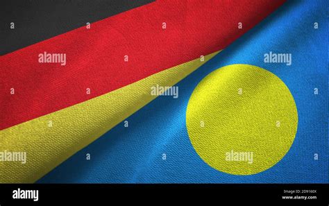 Germany And Palau Two Flags Textile Cloth Fabric Texture Stock Photo