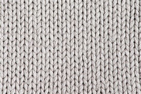 White knitting wool texture background. — Stock Photo © Crawler #23236216