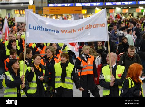 Lufthansa Employees hold a banner during a Lufthansa strike called by ...