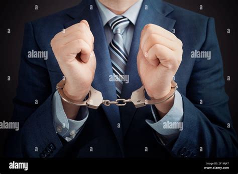 Handcuffs On Hands Hi Res Stock Photography And Images Alamy