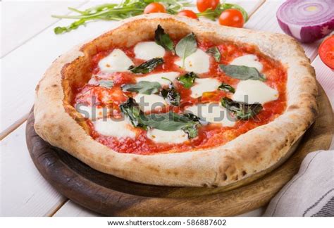 Whole Neapolitan Pizza Served On Wooden Stock Photo Edit Now 586887602