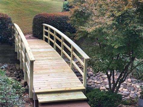 Arched Wooden Bridge Over Dry Creek Bed Designed And Built By Atlanta