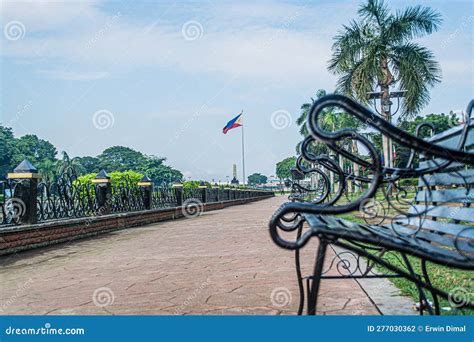 The Benches Along The Path Around The Water Fountain At The Rizal Park