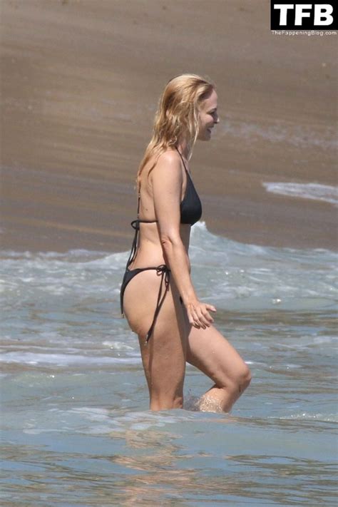 Heather Graham Slips Into A Black Bikini For A Beachside Frolic Next To A Mystery Man 35 Photos