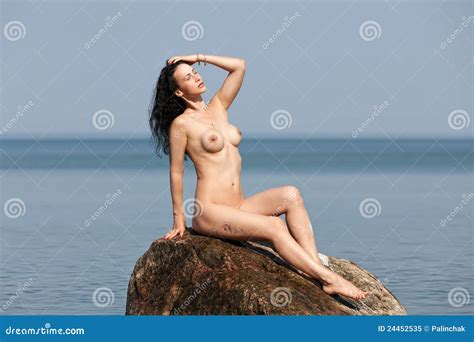 Nude Woman Sitting On A Rock Stock Image Image Of Nude Beautiful