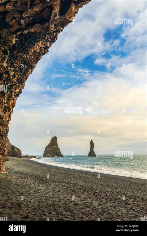 Reynisfjara Black Sand Beach And Reynisdrangar Basalt Sea Stacks In