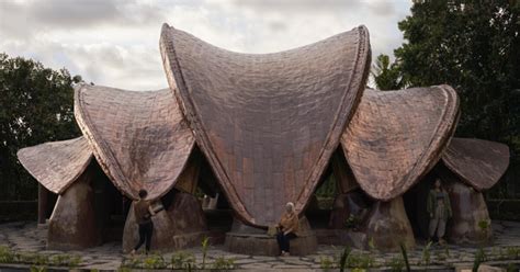 Ibuku S Alchemy Yoga Center Unfolds As Three Sculptural Copper Clad