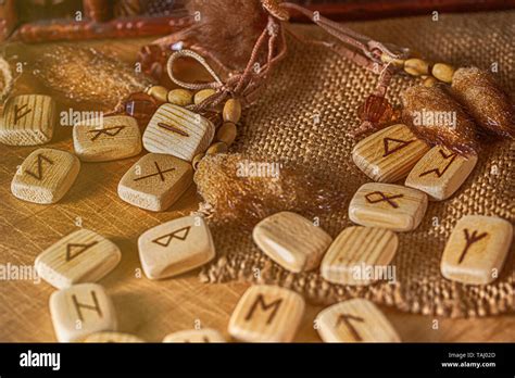 Handmade Scandinavian Wooden Runes On A Wooden Vintage Background