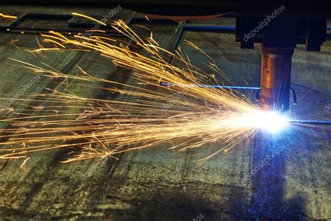 Laser or plasma cutting of metal sheet with sparks — Stock Photo ...