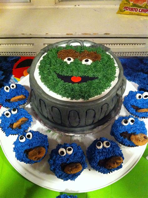 Oscar the Grouch Cake and Cookie Monster Cupcakes......by me JP ...