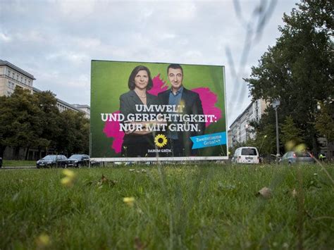 A German Green Party campaign poster says, "Environment and justice, only with Green." 2017 ...