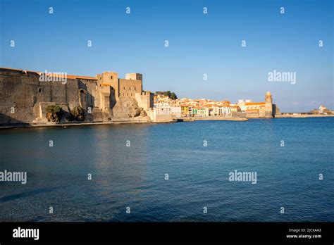 Royal castle of Collioure with the colorful village buildings, Collioure, Pyrenees Orientales ...