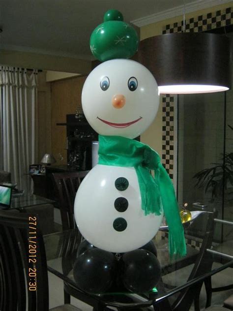 A Snowman Balloon Sitting On Top Of A Table