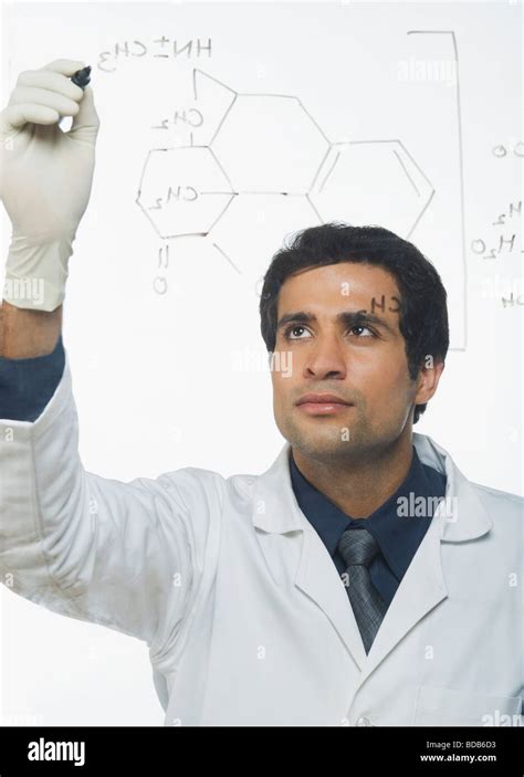 Scientist Writing Chemical Formula Stock Photo Alamy