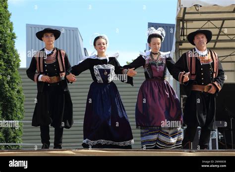 Breton Dancing In Traditional Costumes At Oyster Festival At Arradon