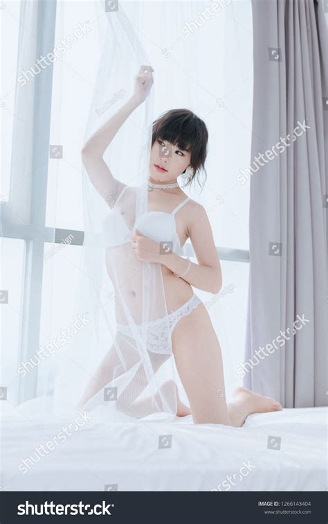 Sexy Woman White Lingerie On Bed Stock Photo 1266143404 Shutterstock