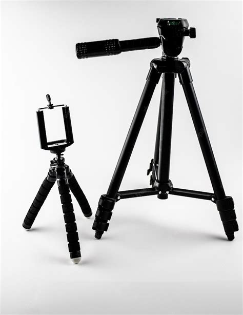 Premium Photo Tripods For The Camera Camcorder On A White Background