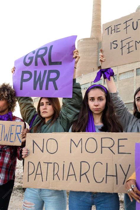 Premium Photo Young Woman Looking At Camera Holds No More Patriarchy