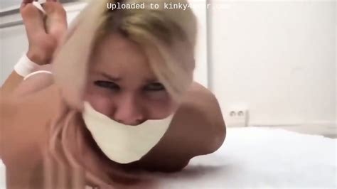 Taken Hogtied Tape Gagged Nude On Rug With Tall Blonde