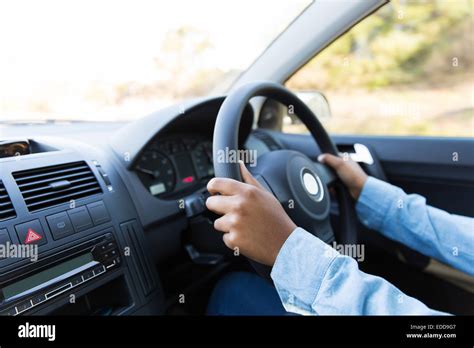 Close Up Of Woman S Hands Holding Steering Wheel Stock Photo Alamy