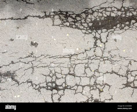 Texture Of Cracked Road Surface Asphalt With Cracks Damaged Road