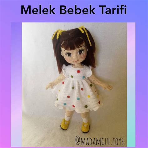 A Doll With Brown Hair Wearing A White Dress And Yellow Shoes