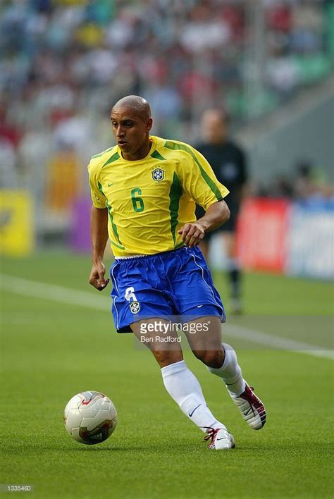 Roberto Carlos of Brazil runs with the ball during the Brazil v ...