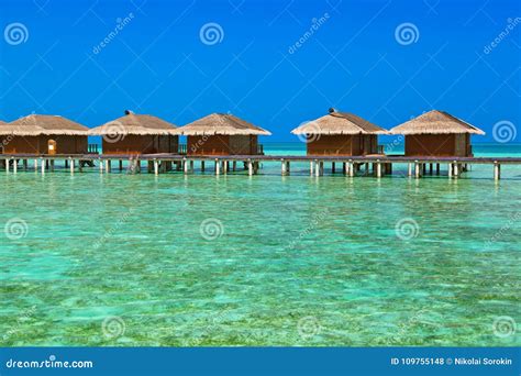 Bungalows on Tropical Maldives Island Stock Photo - Image of building ...