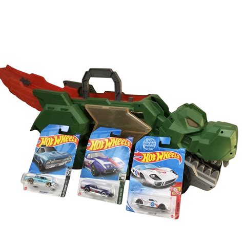 In Dino Transporter And BN Hot Wheels Cars As Pictured