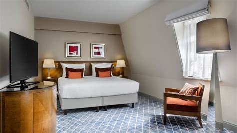 Deluxe Room bed at Warwick Brussels