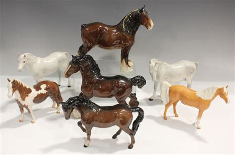 Seven Beswick horses, comprising Shire Mare, 818, Cantering Shire, 975 ...