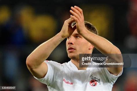 Lukas Podolski of Cologne celebrates after the Bundesliga match... News ...