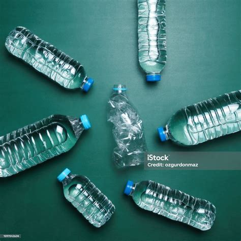 Full And Empty Water Bottles On Isolated White Background Stock Photo ...