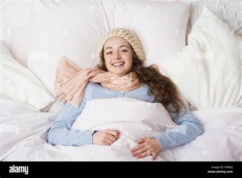 Sick Woman Lying In Bed With High Fever She Has Cold And Flu Stock