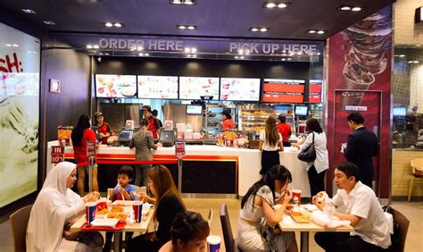 KFC restaurant interior editorial photography. Image of chicken - 64599862