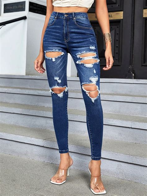 SHEIN Essnce Jeans Ajustados Desgarro Con Abertura Moda De Mujer