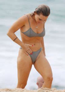 DJ Tigerlily Posing In A Bikini On The Beach Of The Day DrunkenStepFather