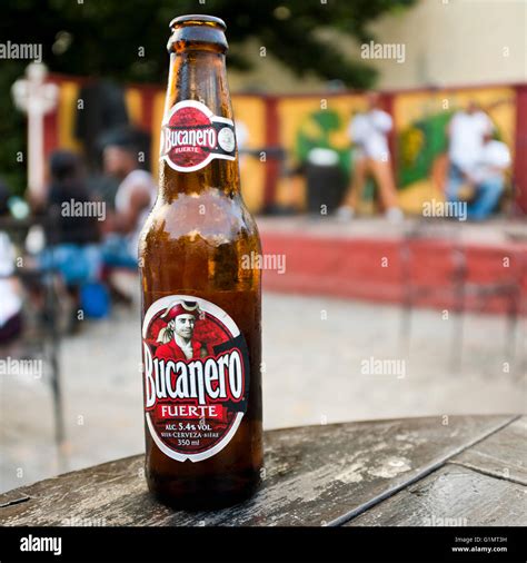 Square close up view of a bottle of Bucanero beer in Cuba Stock Photo - Alamy