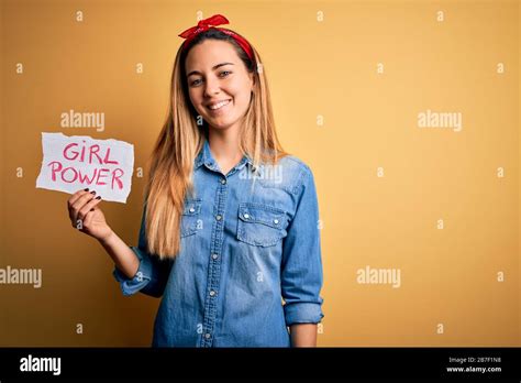 Blonde Woman With Blue Eyes Asking For Girls Rights Holding Banner With Girl Power Message With